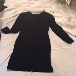 Black velvet lazer cut party or dinner dress.